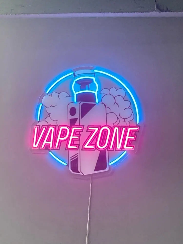 Neonowy szyld z motywem e-papi – Vaping Shop recenzja i cena